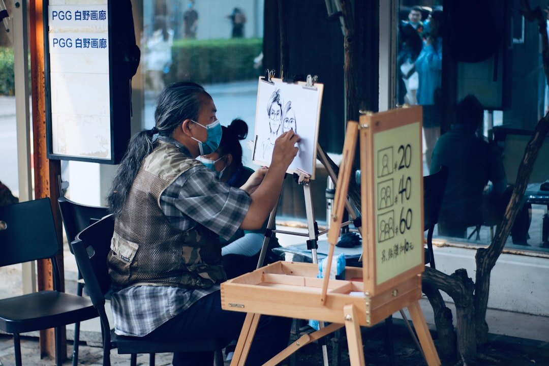 elderly woman in art class