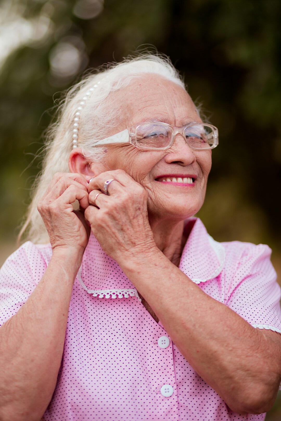 Friendly senior community coordinator woman smiling