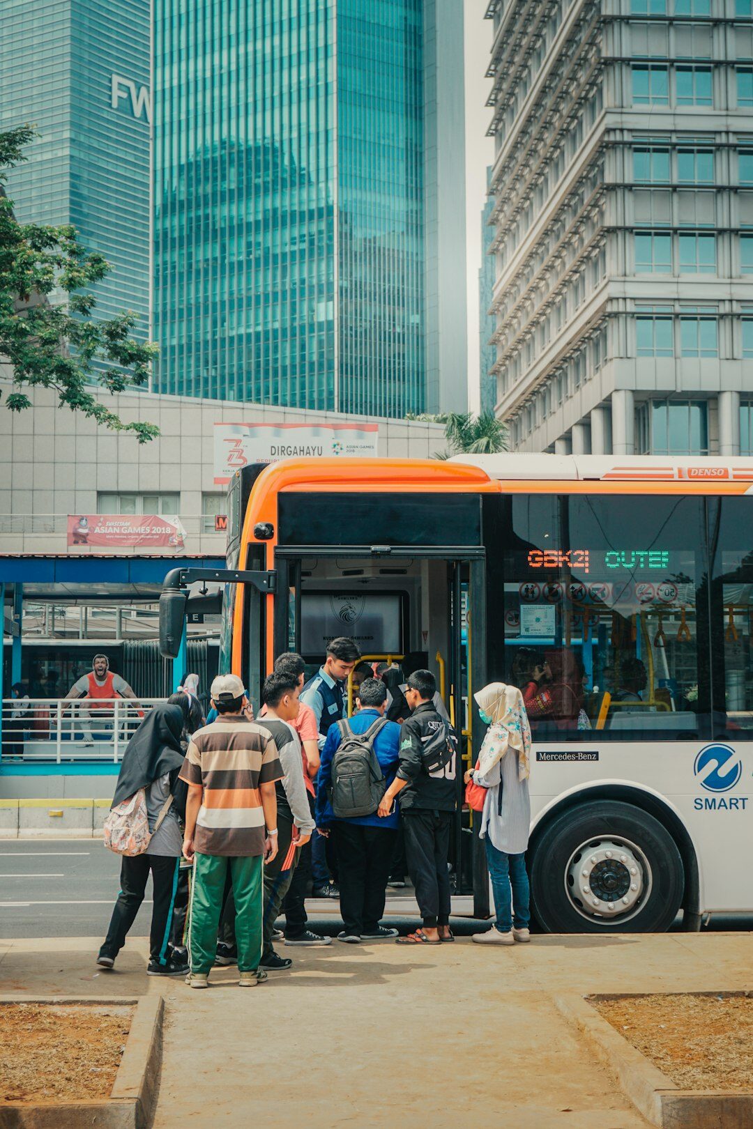 Seniors boarding a bus for a group excursion trip
